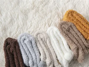Detailed view of cozy coral fleece fuzzy socks, ultra soft winter warm thick mid-calf socks.