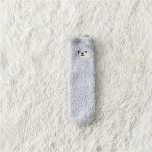 Cozy grey plush sleep socks featuring cute bear ears and sweet embroidery detail for women.
