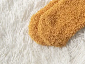 Soft fuzzy coral fleece warm sleep socks for women, thick cozy winter home floor socks detail.
