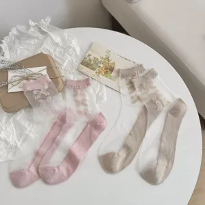 Chaussettes transparentes en mesh pour femmes avec jolis nœuds, semelle coton, style chic.