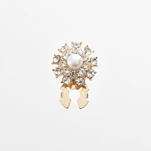 Detailed close-up shot of exquisite golden alloy sunflower rhinestone cufflink button design.