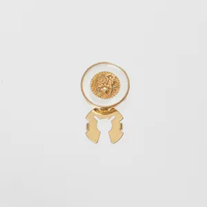 Vintage baroque style metal collar clip and shirt button with white enamel and gold details.