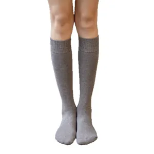 Winter thick grey long socks for women, warm cotton knee high stockings, cozy thermal leg wear.