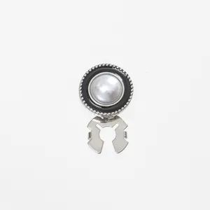 Pearl decorative collar button apparel shirt accessory versatile metal snap fastener detail.