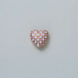 Heart checkerboard cufflink shirt decorative buckle stylish accessory for women detail view.