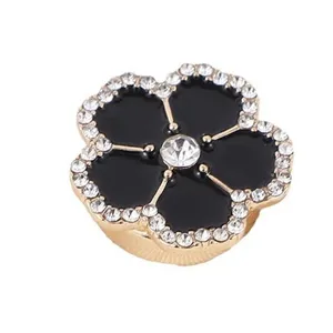 Élégants boutons de manchette noirs en strass fleuris pour femmes, accessoire élégant.