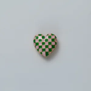 Pink green checkerboard heart cufflink detail, stylish enamel shirt button accessory.