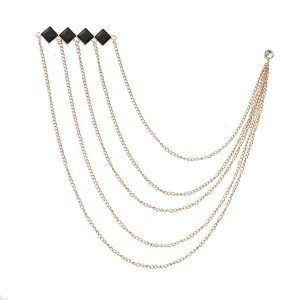 Exquisite multi-layer chain brooch with black diamond rhinestones for suit lapel styling.