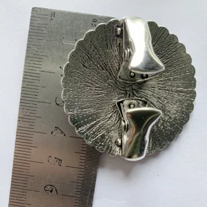 Vintage alloy retro flower shawl clip brooch back view with dual metal clips for secure wear.