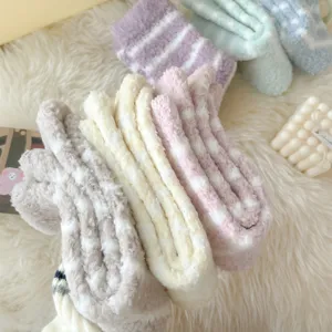 Cozy winter coral fleece fuzzy socks for women, thick warm striped sleep socks for home.