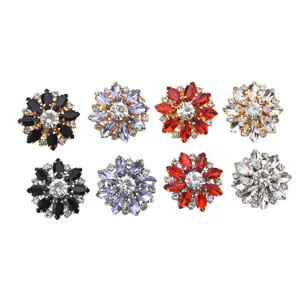 Detailed view of luxury rhinestone flower decorative buttons set, crystal metal craft for clothes.