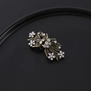 Detailansicht Vintage Strass Schalclip, antike Bronzefluegel Blume Brosche elegante Damen.