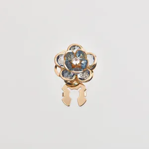 Detail view of crystal camellia flower brooch cufflink for women vintage chic accessory