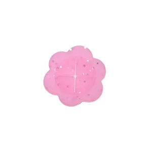 Pink floral silicone clothing cinching clip detail view with cute shiny sparkle design