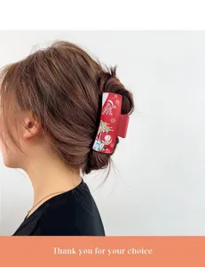 Christmas red acrylic hair claw clip, festive holiday hair catcher for women and girls.