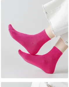 Magenta women's mid-tube socks with fine knit texture and vibrant dopamine style for daily wear.