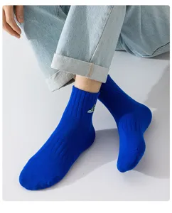 Men's blue embroidered mid tube sports socks detail view, breathable cotton athletic sock.
