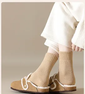 Cozy women's knit wool mid-calf socks in warm camel color for winter daily comfort.