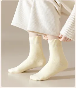 Women's warm winter cashmere mid-tube socks, thick thermal solid color ribbed crew socks.