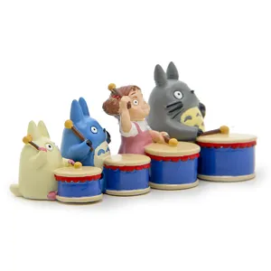 Ghibli Totoro figurine detail view, cute resin miniature characters playing drums for desk decor