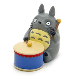 Detailed shot of cute grey resin drum figurine miniature creative desktop ornament decoration