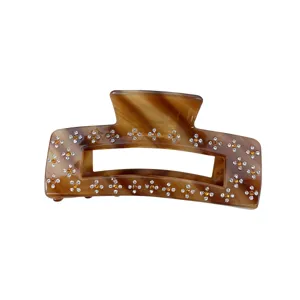 Molla per capelli tartarugata marrone con strass elegante pinza in acetato per donna.