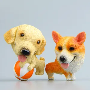 Gedetailleerd uitzicht van hars hond koelkastmagneet met gouden retriever en corgi ontwerp.