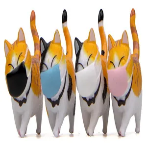 Süße mollige Katzenfiguren mit bunten Masken, perfekte Miniatur Mikrolandschaft Ornamente.