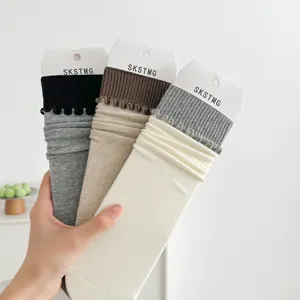 Korean style solid color stackable socks with cute ruffled cuffs for women everyday wear.