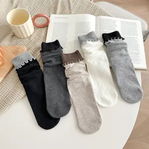 Detailed shot of comfortable cotton ribbed crew stack socks with cute ruffled cuffs for daily wear.