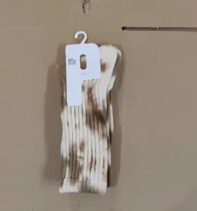 Tie-dye knit mid-calf casual socks detailed close-up shot showing thick textured fabric.