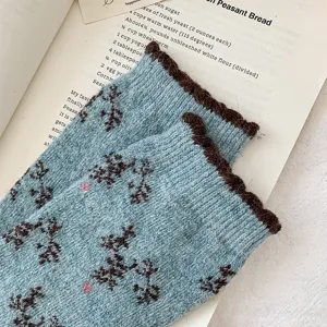 Vintage imitation mink velvet mid-calf socks featuring retro floral pattern and contrast scalloped edge.