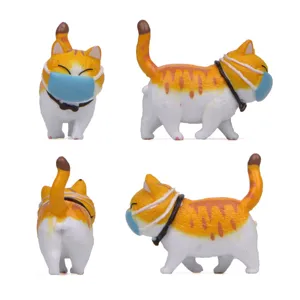 Niedliche fette Ingwer-Katze Figur mit blauer Maske, kreative Kunstharz Miniatur Dekoration.