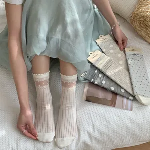 Sweet sheer polka dot mesh mid-calf socks with cute ruffle lace trim for women fashion.
