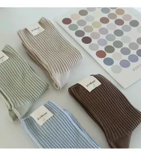 Casual ribbed mid-tube socks in four pastel colors, comfortable cotton daily wear women socks.