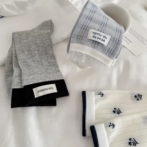 Women short socks set featuring trendy plaid lace designs, breathable cotton mesh, stylish.