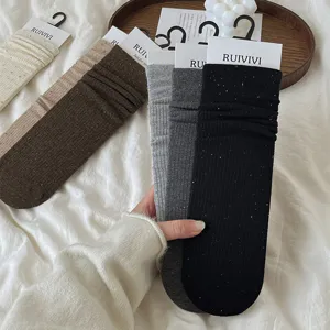 Calze slouch da donna a tinta unita con righe verticali e filato a pois colorati, comode.