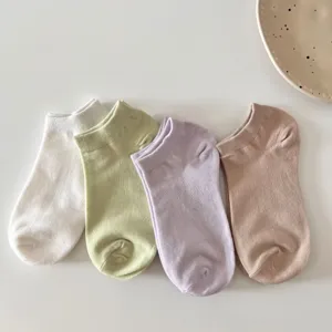 Detail view of breathable macaron color women short boat socks, comfortable cotton low cut style.