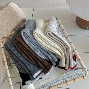 Korean style thick knit long socks with contrast color rolled cuffs and cable pattern for women.