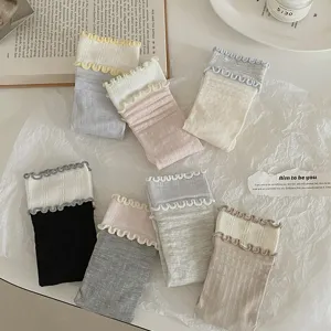 Ruffle trim mid-calf socks with vertical stripes and cute color block design for sweet daily wear.