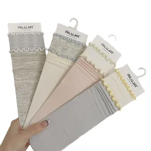 Sweet ruffle mid-calf socks with vertical stripes, cute stacked design for women daily wear.