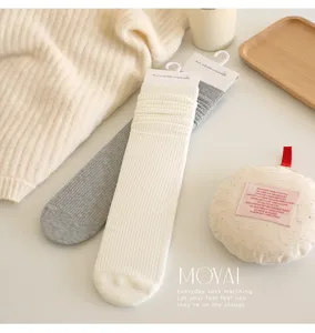 Comfortable solid color vertical striped women calf socks for daily wear, soft and versatile.