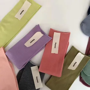 Detail view of Korean candy color summer cotton ribbed mid tube socks rolled edge design.