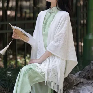 Elegant white knitted cape shawl with tassels for women, hollow design, perfect for cheongsam.