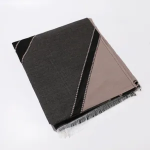 Stylish women colorblock shawl detail, modern diagonal striped scarf with fringe.
