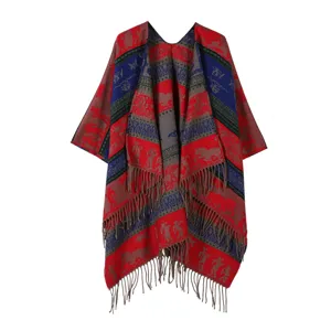 Poncho in maglia stile etnico con frange, scialle retro colorato per donne viaggio abbigliamento.