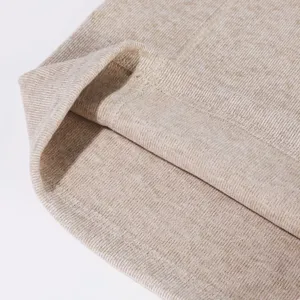 Close-up detail of thermal ribbed knit neck gaiter, showing fine texture and stitching.