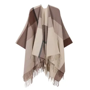 Detailed view of the classic winter plaid tassel cape shawl for women, warm outerwear.