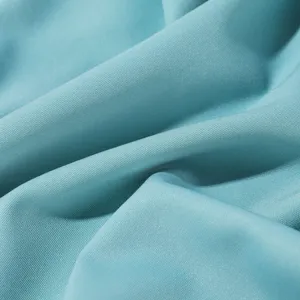 Ice silk fabric detail close-up, breathable sun protection material texture view.