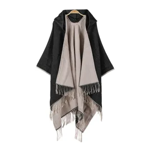 Women fashion autumn winter warm reversible tassel hooded cape shawl cloak detail.